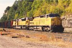 Helpers shove coal loads west